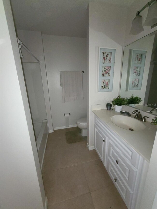 8840 Grand Palms Cir unit A, Kissimmee, FL 34747 - photo 7