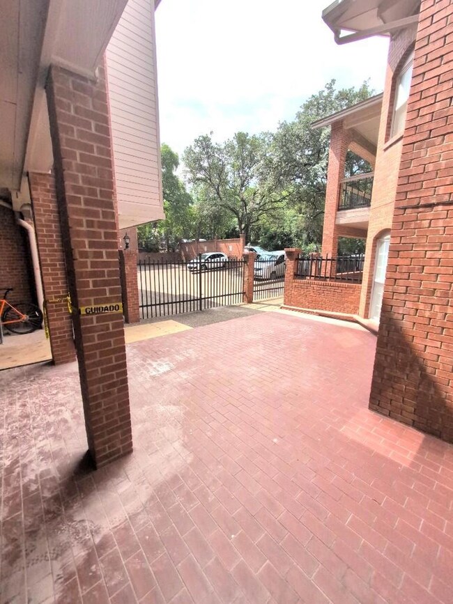 View of patio / terrace featuring fence