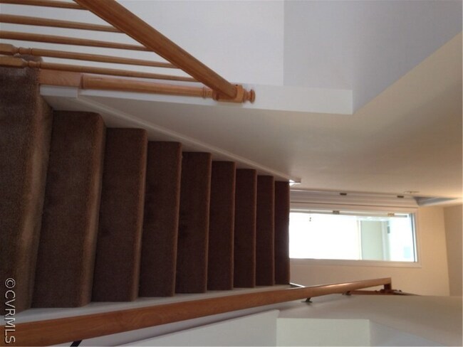 Popular REAR STAIRCASE has NEW CARPET and is open