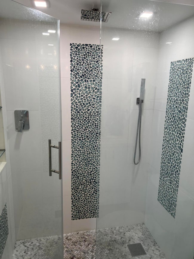 walk-in shower with rain head shower