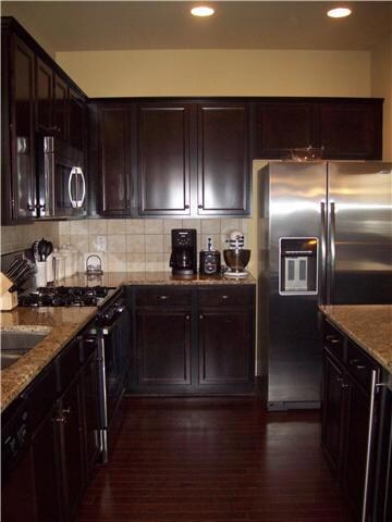 Kitchen- Kona Cabinets, Stainless Steel Appliances