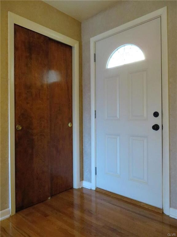 New front and storm door to the right. Coat closet