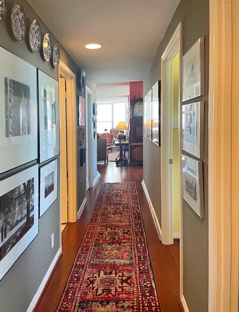 Hallway from primary bedroom looking back to forma