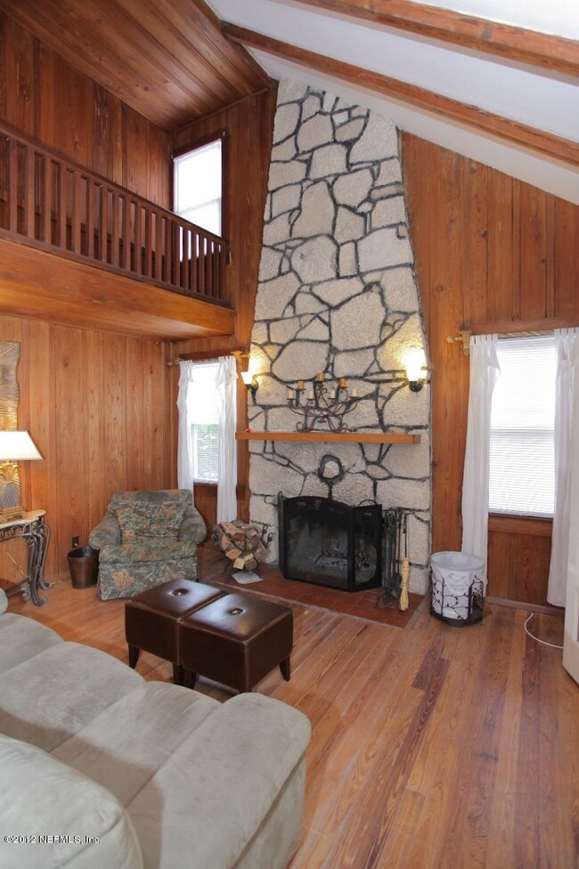 Two story coquina fireplace