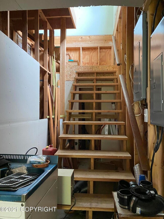 stairs to the unfinished living area