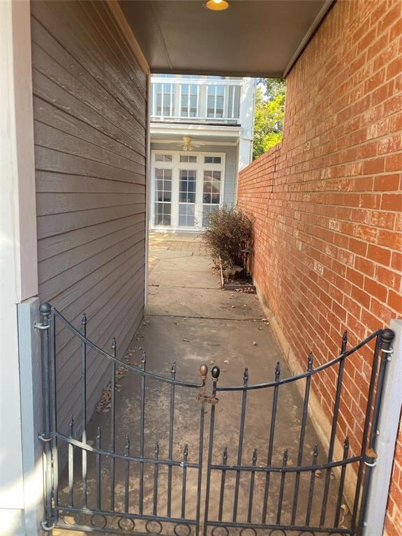 View of entry patio / terrace with decorative gate
