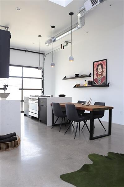 Chefs kitchen with custom built reclaimed wood tab