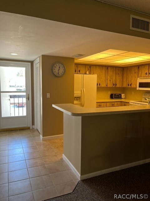 Entry and kitchen view from family room