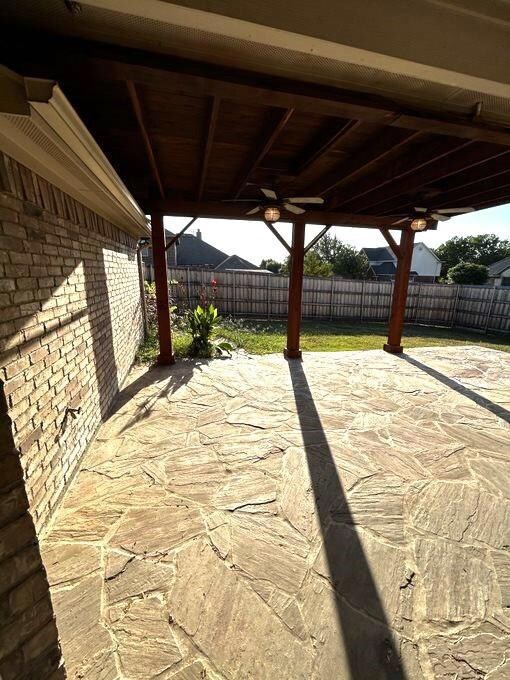 View of patio / terrace featuring ceiling fan