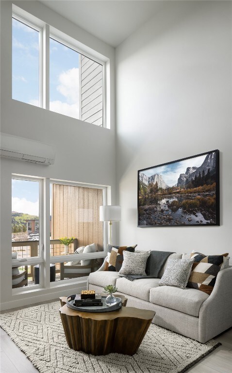 Living area featuring high ceilings