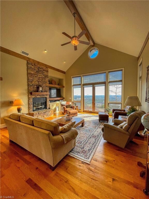 Living room directly off entry boast long range views of the Uwharrie National Forest and Tuckertown resivoir.