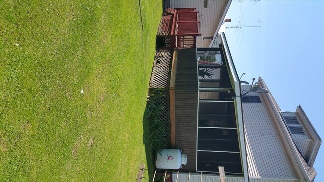 Screened in Porch and Deack in back.