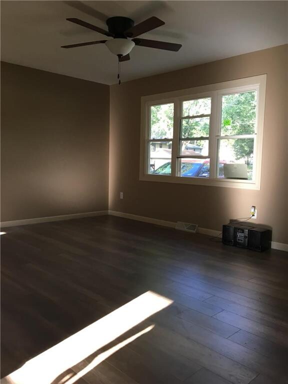 Living Room with new flooring, windows, light fixt