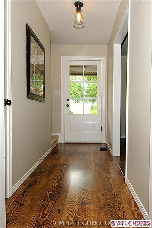 BEAUTIFUL ENTRY FEATURES NEW PAINT & FIXTURES