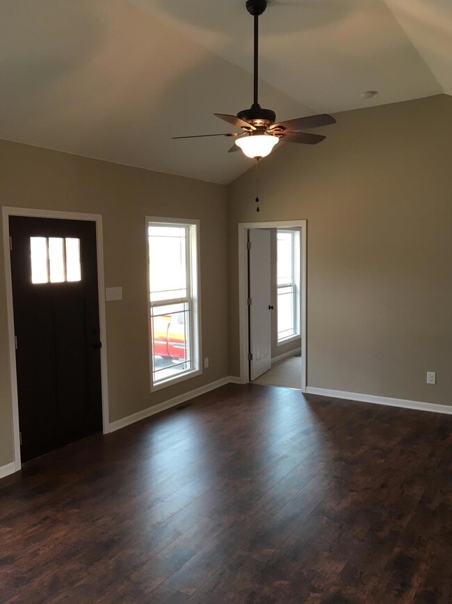 Living room with raised ceiling.