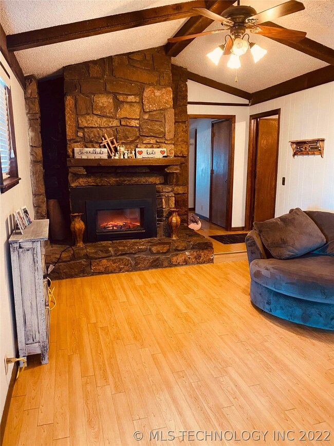 FAMILY ROOM WITH WOOD BURNING FP OR OPTION OF ELEC