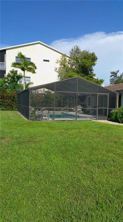 Backyard and Screened Swimming Pool