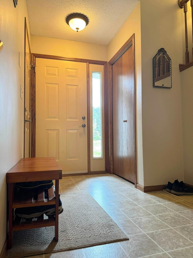 A shot of the front door and the entryway.