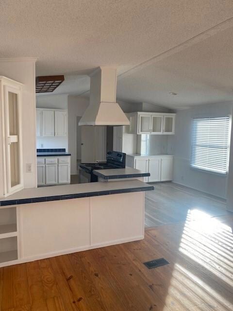 Unfurnished room with dark hardwood / wood-style floors