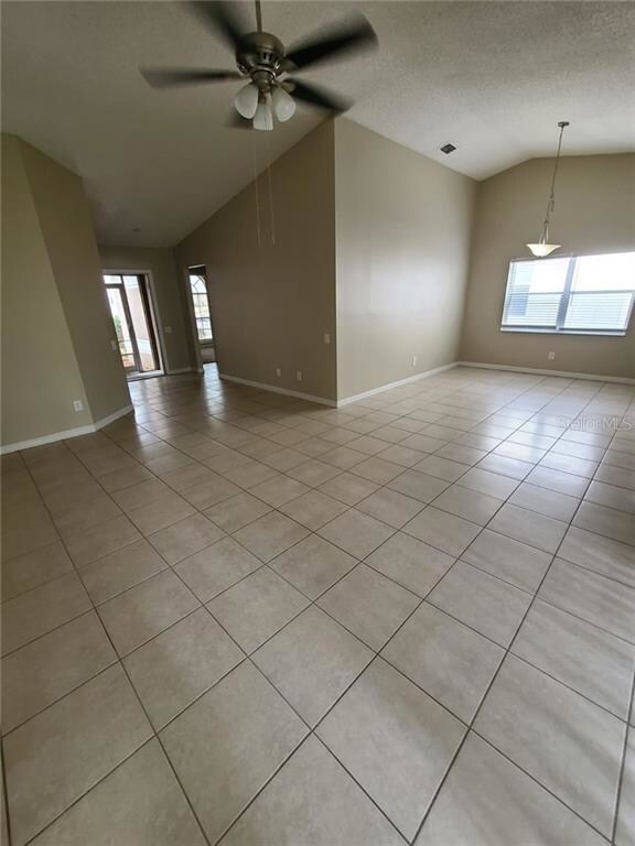 LIVING ROOM LOOKING AT ENTRANCE (LEFT) DINNING ROO