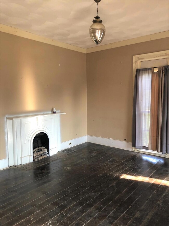 Beautiful living room with tall ceilings, large wi