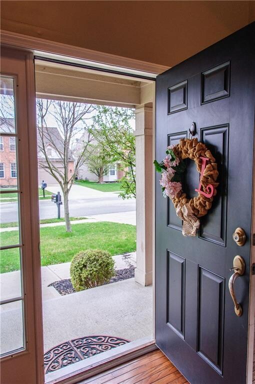 Entry way features 2 story foyer and real hardwood floors