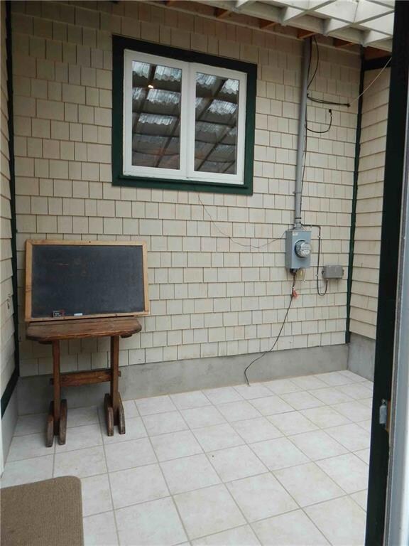 Enclosed patio area is nice way of...
