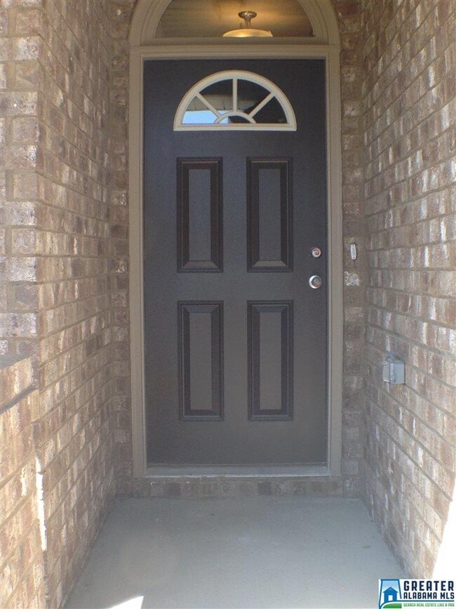 This covered front porch welcomes you home!