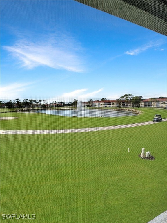View of home's community with a water view
