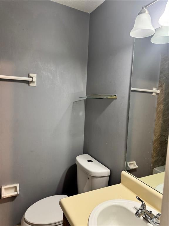 Bathroom featuring toilet and vanity