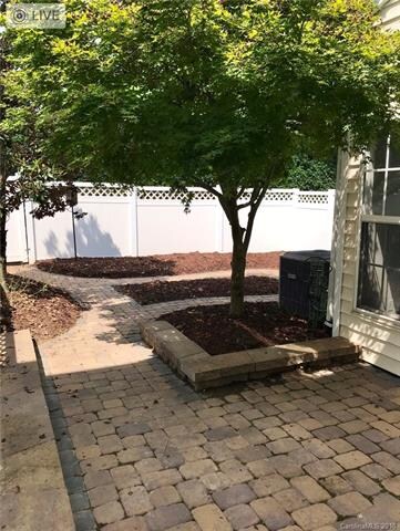 Another view of the fenced back patio area.