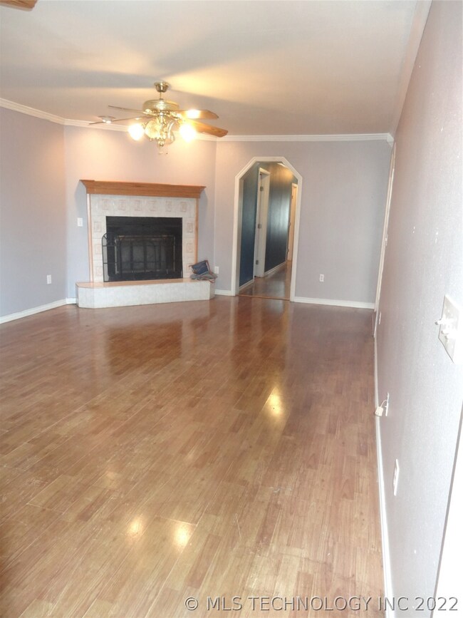 View of Living Room from front entrance. Wood burn