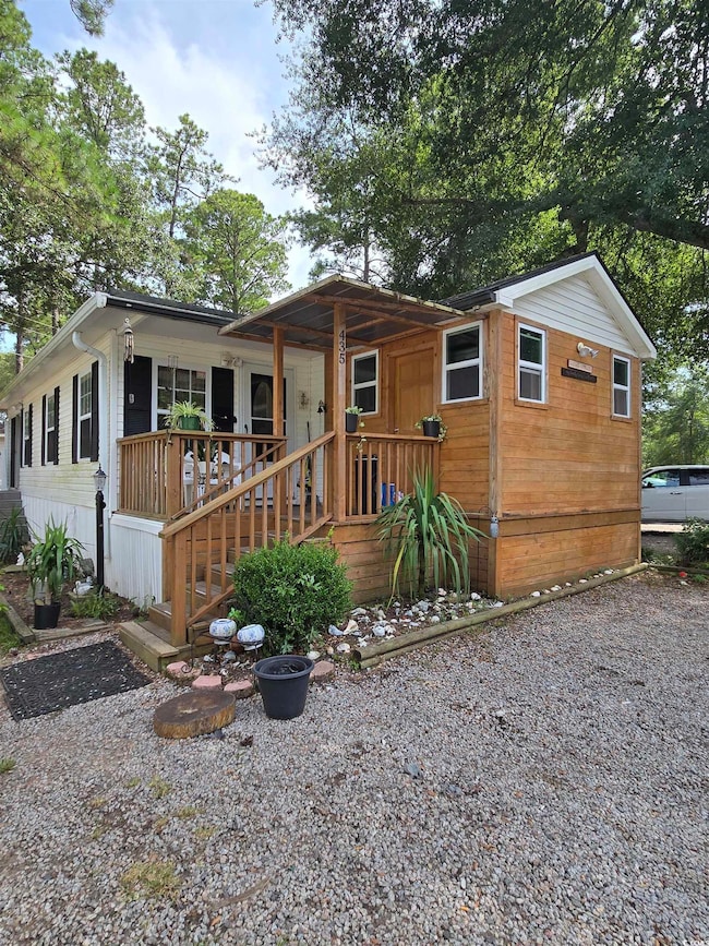 View of front of property with a porch