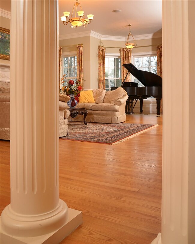 Elegant living room with large piano bay