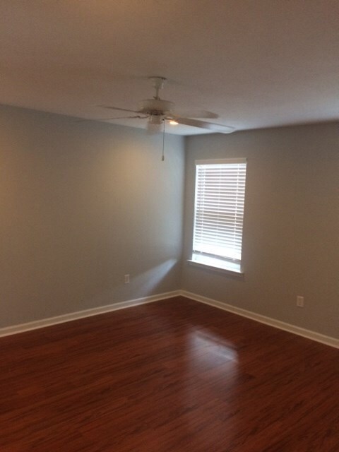 Down Master Bedroom w/ Bamboo Hardwood