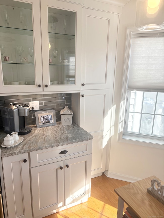Eat-in Kitchen with Granite and Plenty of Cabinetr