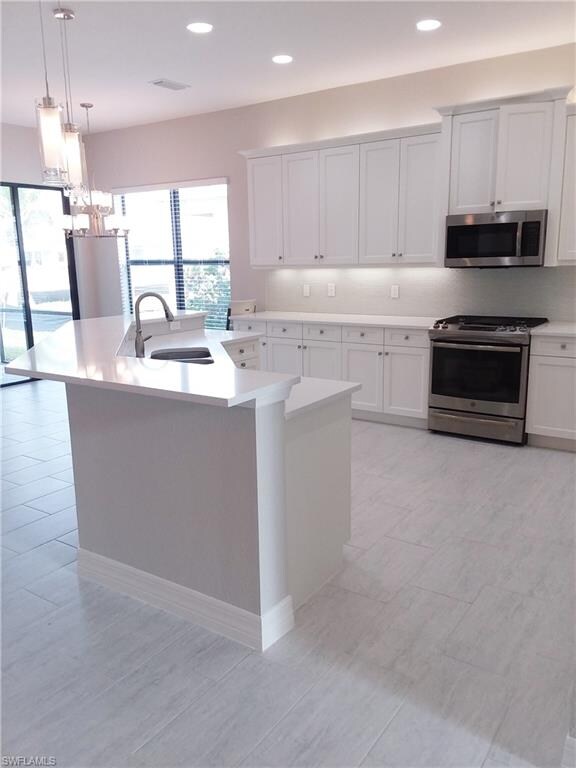 Gorgeous kitchen with quartz, stainless steel appl
