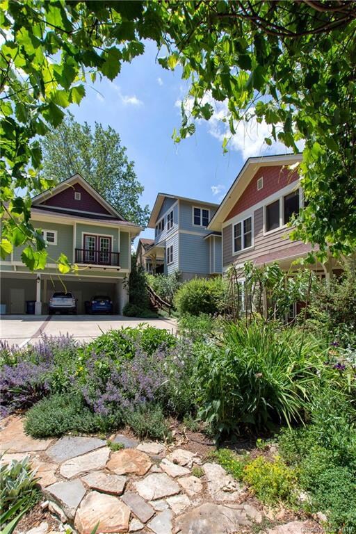 Covered Parking with Storage in Front of Parking Spaces