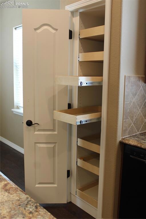Pantry features roll out shelves