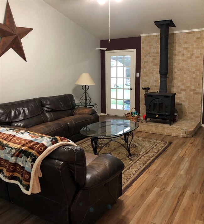 Vaulted Ceiling and wood burning stove.