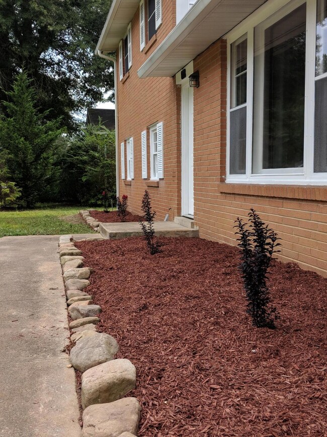 Front of the home is clean with new landscaping.