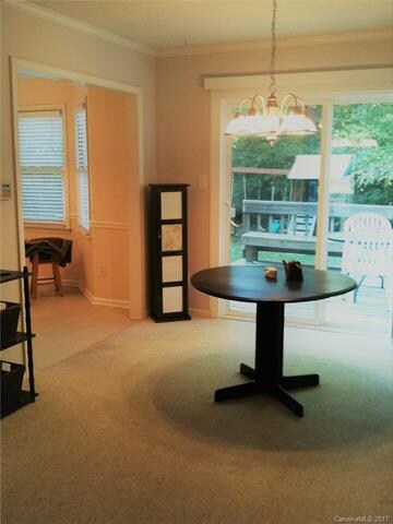 Dining Room with sliders leading to the back deck 