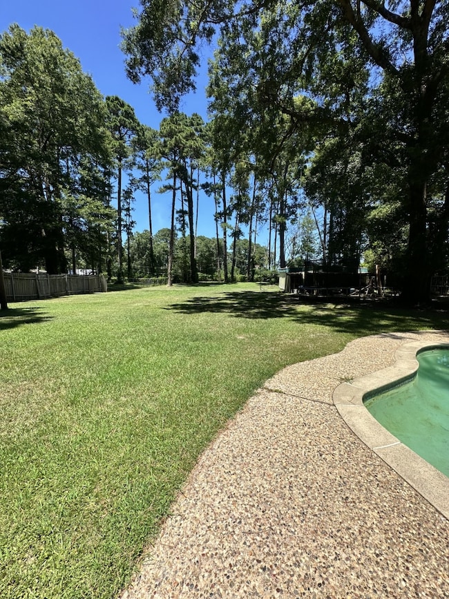 View of property's community with a pool