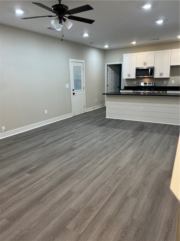 ully outfitted kitchen with stainless appliances