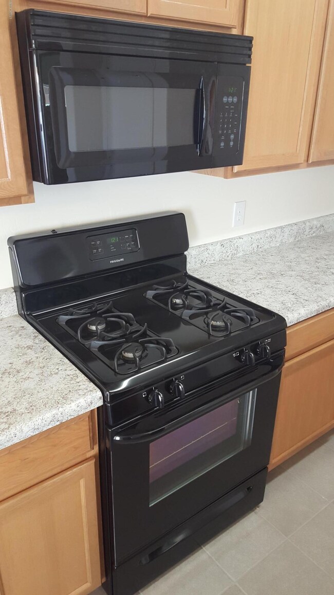 Black gas range and micro
