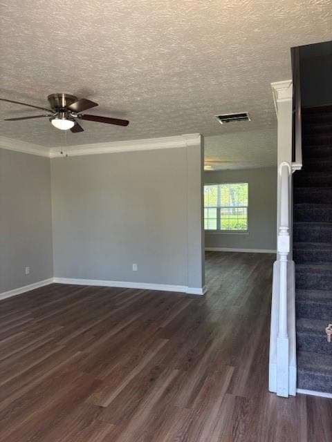Spare room featuring dark wood finished floors, a 