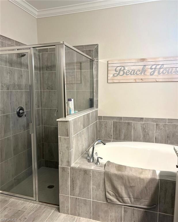 Main bath with shower and soaking tub