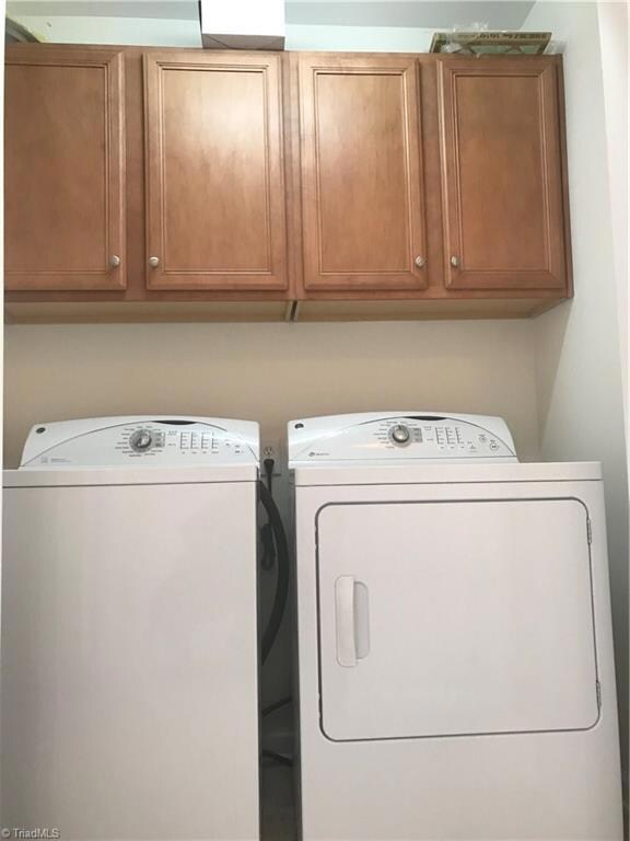 Laundry room is upstairs between the two bedrooms.  Washer and dryer to stay.