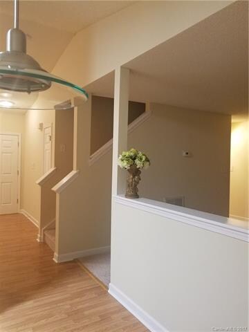 View from kitchen area, of front door, entance