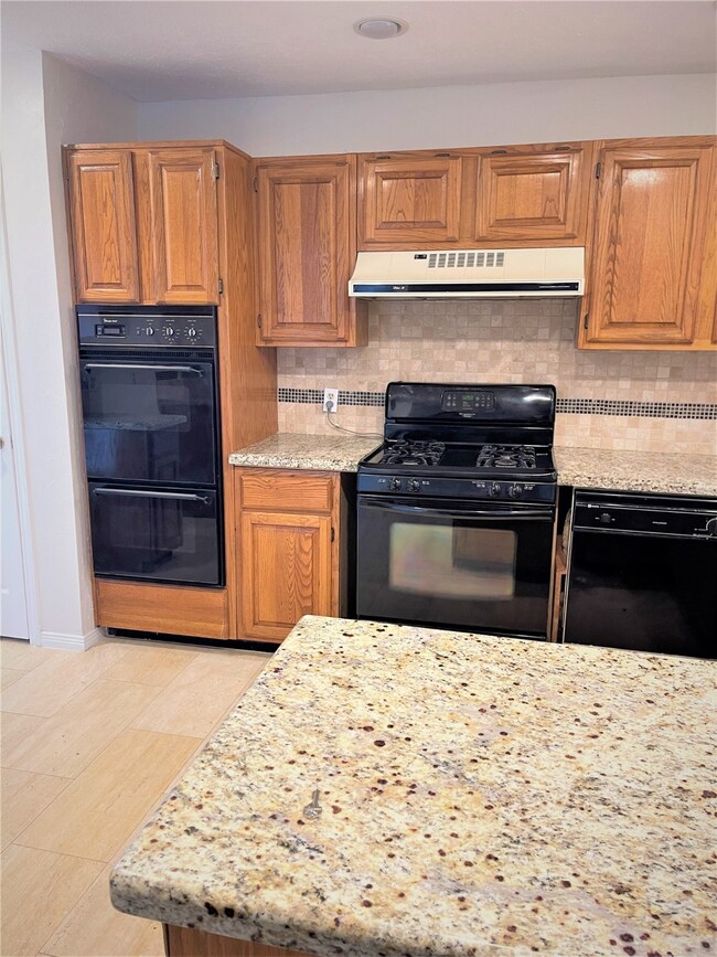 Kitchen Showing Oven and Stove